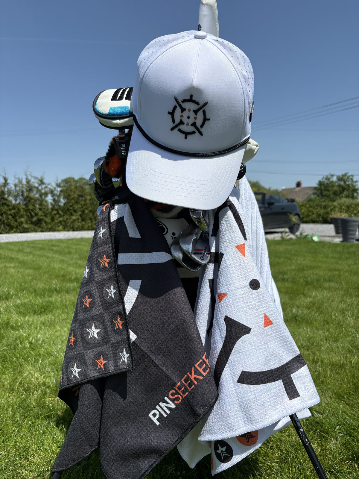 PINSEEKER golf towel and cap range
