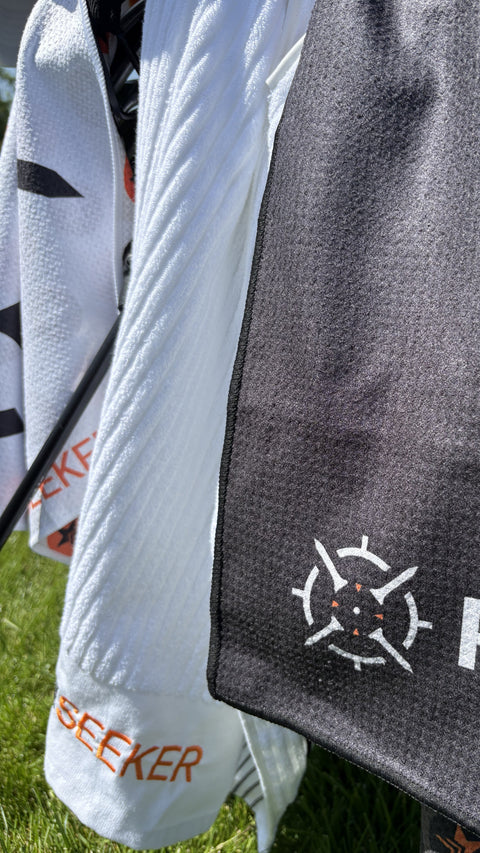 PINSEEKER golf towel and cap range