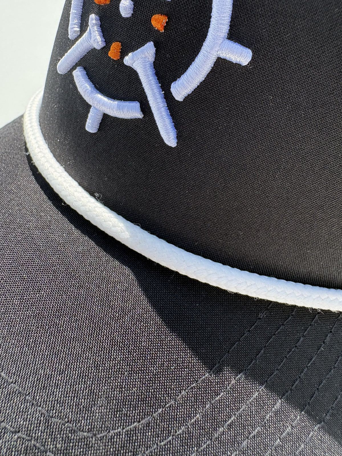 PINSEEKER Performance Golf Cap in black, Blackout colourway