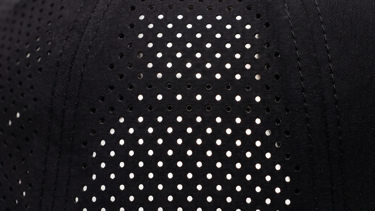 Heat leaves through the panels, not a mesh back